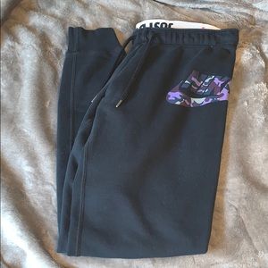 Black Nike Joggers with a “Just Do It” Waistband